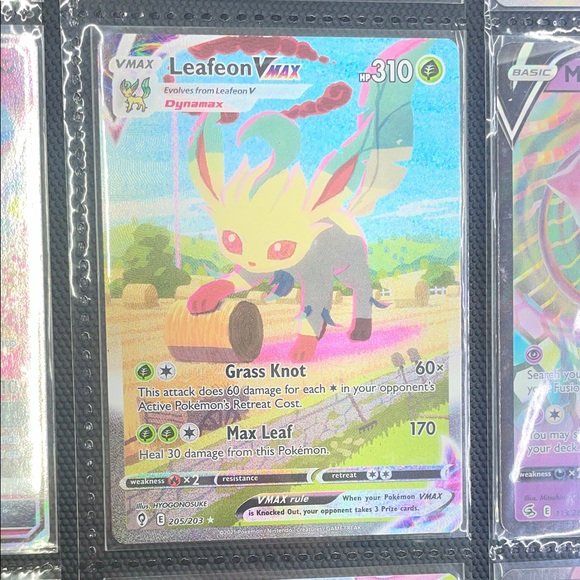 Pokemon Leafeon VMAX Trading Card - Green and Pink Pokemon Leafeon VMAX Trading Card - Green and Pink